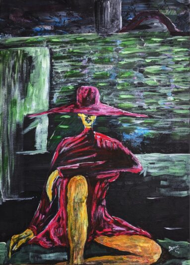 woman in red sitting by river